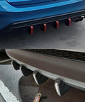 Heavy Duty Abs Rear Bumper Lip Diffuser Spoiler For Tesla Cybertruck 2023 To 2026, showing sleek rear design with four exhaust openings.