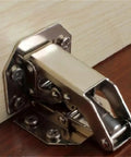 Rock Solid Stainless Steel Cabinet Door Hinge Featuring Drop Dead Smooth Hydraulic Soft Closing 90 Degree Folding Furniture Hardware That Shuts Quietly Without Making A Peep White installed on wood.