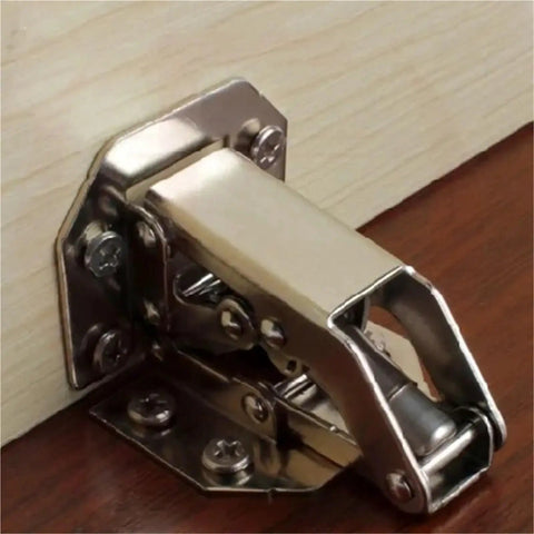 Rock Solid Stainless Steel Cabinet Door Hinge Featuring Drop Dead Smooth Hydraulic Soft Closing 90 Degree Folding Furniture Hardware That Shuts Quietly Without Making A Peep White installed on wood.