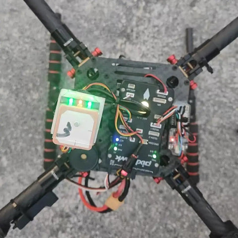 10Hz GPS Drone Module With Compass For FPV Racing Drones installed on quadcopter, showing connection compatibility and integration.