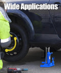Heavy Duty Alloy Steel Hydraulic Toe Jack With Dual Point 20 Ton Top Lift And 10 Ton Edge Catch in use to lift vehicle for maintenance.