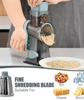 Person using Rotary Cheese Grater Hand Crank No-Fuss Transparent Shredder Slicer Grinder With 3 Stainless Steel Blades, Suction Base