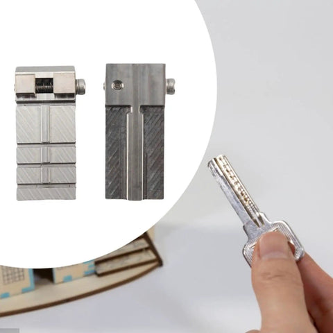 Thinking Process: stainless steel key fixture clamp, 16.9x54.1mm, shown holding a key for cutting duplicates