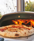 Multi Fuel Outdoor Pizza Oven For Wood And Gas With 12 Inch Pizza Stone And Integrated Thermometer Dual Fuel Pizza Maker in use