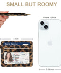 Ultra Slim Minimalist Card Holder Wallet With RFID Blocking, Pocket Ready And Lightweight, Leopard print next to smartphone
