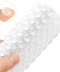 Premium Clear Silicone Cabinet Door Bumpers 200 Pack 0.4 Inch Round Self Adhesive Furniture Pads close-up on surface