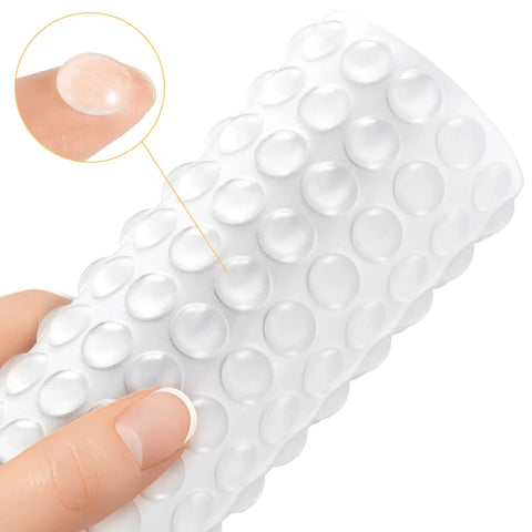 Premium Clear Silicone Cabinet Door Bumpers 200 Pack 0.4 Inch Round Self Adhesive Furniture Pads close-up on surface