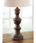 Magaly Cottage 27.65 Inch Table Lamps 2 Pack Brown Faux Wood With Drum Shade on wooden table with bright background
