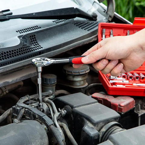Using 46 Piece One Quarter Inch Drive Socket Ratchet Set For Auto And Home Repair on car engine with red tool case