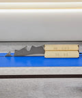 Premium Brass Setup Bars And Precision Height Gauge Master Kit For Woodworkers Includes Eleven Laser Marked Guide Blocks displayed beside a router blade.
