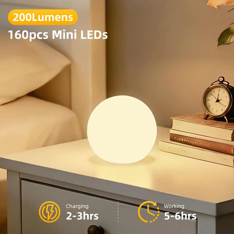 Bedside with glowing 4 Inch Cordless LED Cube Night Light With 16 RGBW Colors And Remote Control Rechargeable Battery Mood Lamp.