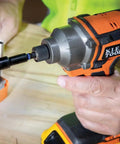 Close-up of hand using 26-Piece Impact Driver Bit Set With Nut Driver And Screwdriver Bits In Durable Case, Extended Reach Pro Bits.