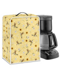 Slick Hummingbird Floral Coffee Maker Cover protects black coffee maker, waterproof polyester, floral design, heavy duty handle.