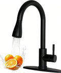 IKEBANA Black Kitchen Faucet with Pull Down Sprayer, stainless steel and matte black, featuring water flow over oranges.