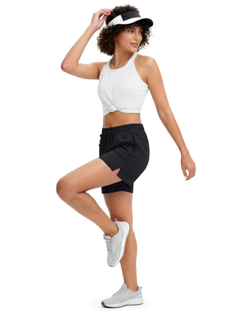 Woman wearing Women's Athletic Hiking Running Shorts With Pockets Lightweight Quick Dry Outdoor Active Shorts For Summer Trails Black