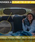 Car interior with installed Rear Window Sun Shade for Cars with Suction Cups, UV Protection Mesh Cover, 39 by 19 inches, clear view.