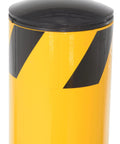 Heavy Duty Steel Safety Bollard Standing 42 Inches High By 5.5 Inches Wide In Bright Powder Coated Yellow For Indoor Outdoor Parking Garage Protection Designed Tough As Nails To Handle Vehicle Impact With Quick Install Welded Base top view showing black and yellow design.
