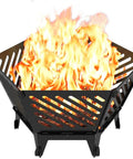 Twenty Two And A Half Inch Portable Hexagon Fire Pit With Travel Bag Smokeless Patented Hexagon Design Featuring Diagonal Vents Outdoor Wood Burning Fire Pit For Camping Backyard Patio Bonfire Picnic And BBQ showing flames through diagonal vents.