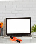 Phone Screen Opening Tool Kit With Suction Cup And Pliers For Quick Repairs on desk next to laptop and pen holder