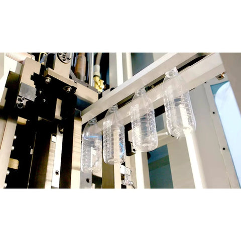 High Speed Automatic PET Bottle Blowing Machine with adjustable molds for producing clear plastic bottles in beverage factory.