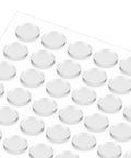 Heavy Duty Adhesive Non Slip Bumper Dots For Glass Tables And Cabinets Provide Dang Good Grip While Keeping Furniture Straight Up Safe From Daily Scratches And Slipping Hazards, clear silicone pads on a sheet.