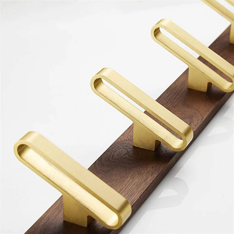 Heavy Duty Solid Wood Double Coat Hook With Sleek Brushed Gold Finish Wall Mounted Robe Rack showing four brushed gold hooks on wood.