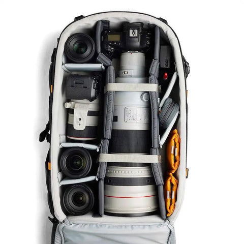 Interior of Pro Trekker BP 650 AW II Outdoor Camera Backpack with Weatherproof Cover showcasing space for DSLR, 800mm lens