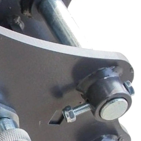 Close-up of mechanical quick hitch system for 0.5-3 ton mini excavator, showing screw-lock coupling mechanism and bolts.