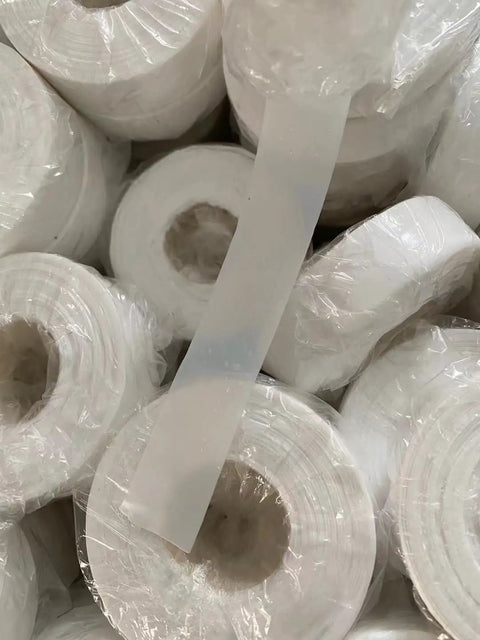 Close-up of Oily PTFE Thread Seal Tape For Natural Gas Piping 5 Rolls 20mm By 0.2mm High Temp Resistance Up To 260C