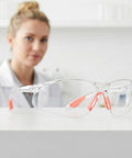 Straight Up Durable Four Pack Kickass Wraparound Safety Glasses Featuring Soft Silicone Frames And Ansi Z871 Certified Lenses For Slick Everyday Eye Protection That Hits Just Right on a white surface with a blurred background.