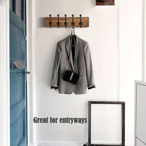 Built Dang Tough Rustic Cast Iron Wall Hooks Heavy Duty Farmhouse Coat Hangers Durable Vintage Hanging Hardware Set Of Five For Entryways And Closets With Upgraded Style. Wall hook with gray blazer and bag.