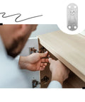 Person installing Top Shelf Heavy Duty Metal Bed Rail Brackets With Concealed Headboard Mounting Hardware Six Piece Kit on furniture.
