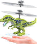 Dinosaur RC Ball Flying Toy For Kids 8-12 Infrared Induction Remote Control Dino With LED Lights hovering over a hand