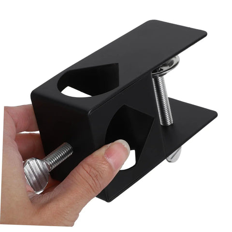 Close-up of Adjustable Deck Torch Holder Bracket With Pole Clamp For Outdoor Tiki Torches, Durable G Clamp For A Rock Solid, No Fuss Mount In Gardens And Patios, Easy Setup And Secure, Weather Resistant held by hand.