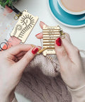 Hands using Wooden Yarn Wrap Guide Board With Clasp WPI Gauge For Spinners Yarn Measuring Tool Crochet Accessory Spiral Leaves Design