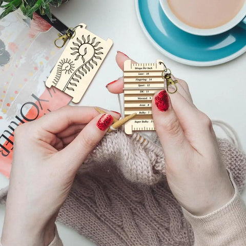 Hands using Wooden Yarn Wrap Guide Board With Clasp WPI Gauge For Spinners Yarn Measuring Tool Crochet Accessory Spiral Leaves Design
