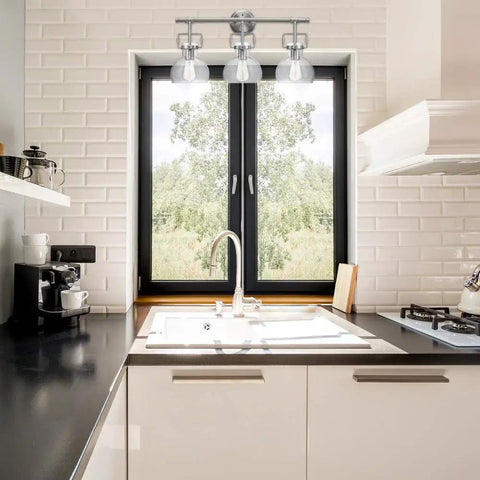 Kitchen scene with a window framed by a 3-light fixture, illustrating lighting style from the All In One Bathroom Vanity Set With A 3 Light Fixture.