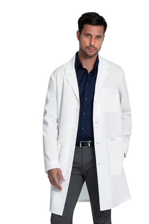Model wearing Plus Size White Lab Coat For Men And Women With 3 Pockets And 38 Inch Center Back Length CK460 3XL, front view.