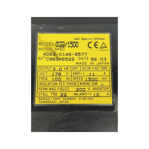 Label of AC servo motor showing specifications and model number, indicating electrical and mechanical details.