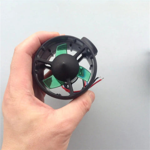 Hand holding a 70mm jet pump, part of the 12V 24V Underwater Thruster With 300KV Brushless Motor, for ROV, RC Boat, and Underwater Robot.