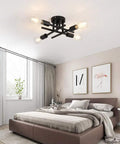 Semi Flush Mount 4 Light Ceiling Chandelier Matte Black With E26 Base shown in a modern bedroom setting