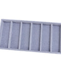 Keep Your Shades Locked And Loaded In This Slick Six Slot Sunglasses Tray And Jewelry Display Holder Crafted From Premium Soft Fabric For Zero Stress Eyewear Organization in grey fabric.
