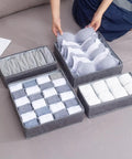 4 Piece Foldable Fabric Drawer Organizer Set For Socks And Underwear Storage Using A Nifty Layout To Keep Your Closet Clean Maximize Dresser Space While Delivering Zero Extra Stress Overall, with gray fabric compartments for organizing bras and socks.