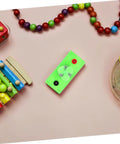 Mini Solar Powered Generator Motor for DIY Science Projects and STEM Kits, green unit, hands-on learning tool on table.