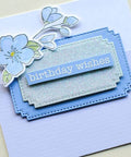 Greeting card featuring blue stitched nesting frames from 7 Piece Rectangle Frame Die Cut Set With Stitched Nesting Frames For DIY Scrapbooking