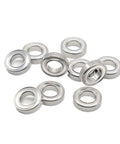 Amp Up Your Gear With Double Sealed Deep Groove Ball Bearings 10 Pack Size 6700ZZ 10X15X4mm Steel bearings arranged in a pile.