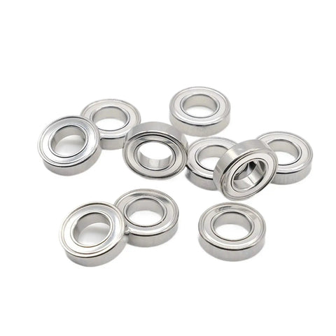Amp Up Your Gear With Double Sealed Deep Groove Ball Bearings 10 Pack Size 6700ZZ 10X15X4mm Steel bearings arranged in a pile.