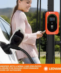 Top Tier Level Two Electric Vehicle Charger Delivers Hella Fast 48 Amp 11point5 Kilowatt Power With A Slick Screen Interface J1772 Connector  in outdoor setting.
