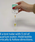 Slick Freshwater And Saltwater Aquarium Carbonate Hardness Test Kit Using Liquid Reagents to Dodge PH Swings and watch over tank crew with glass tube filling.
