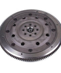 Heavy Duty Steel Clutch Flywheel Replacement For 2003 To 2009 Subaru Baja Legacy Outback 2.5L Boxer Engine Direct Swap showing top view with bolt holes.